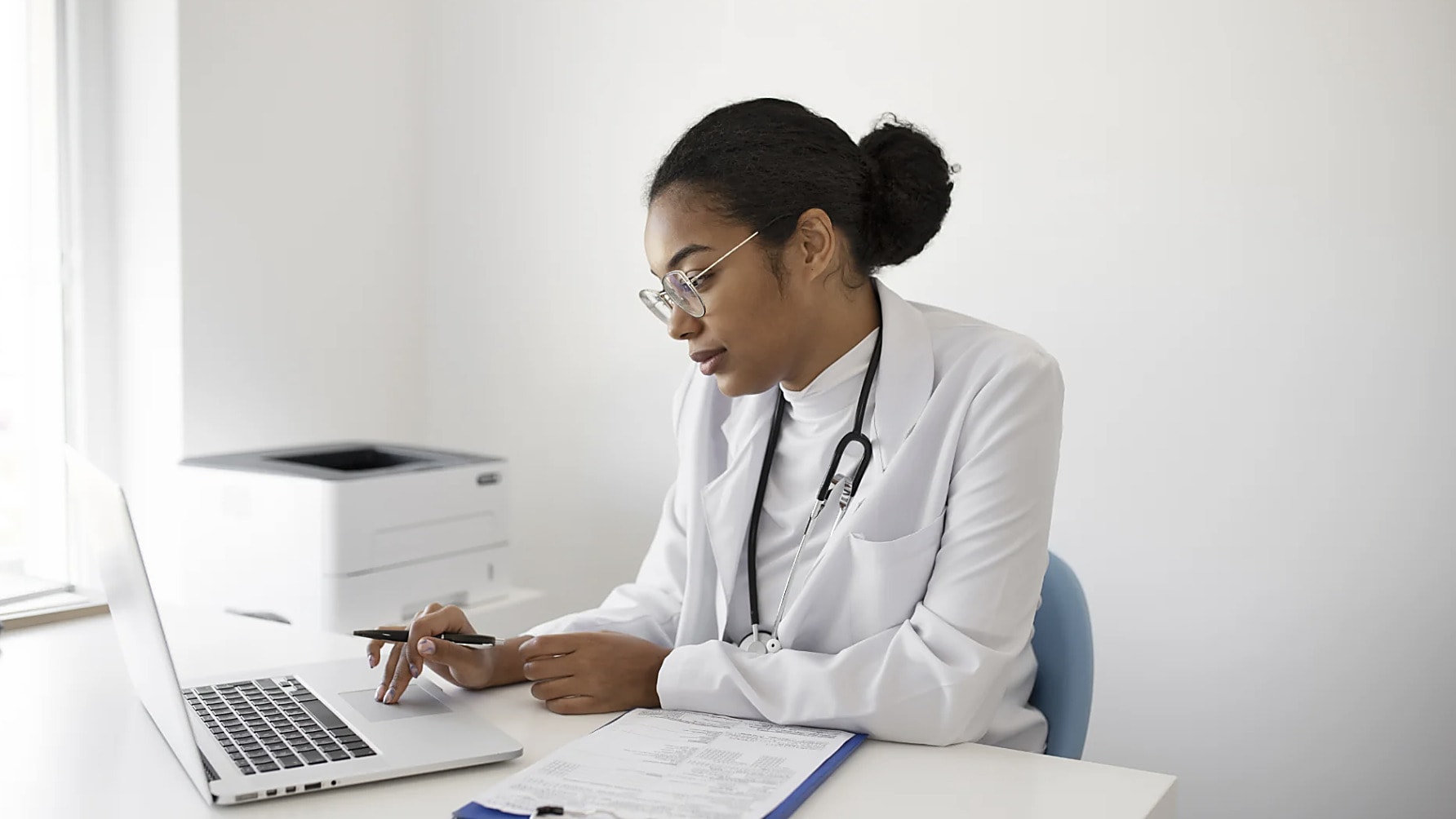Medical biller reviewing a claim